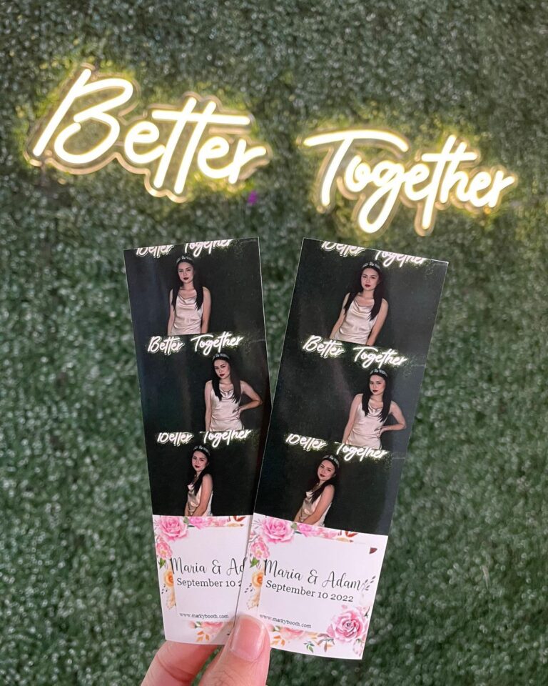 Having fun at a wedding photo booth rental Houston