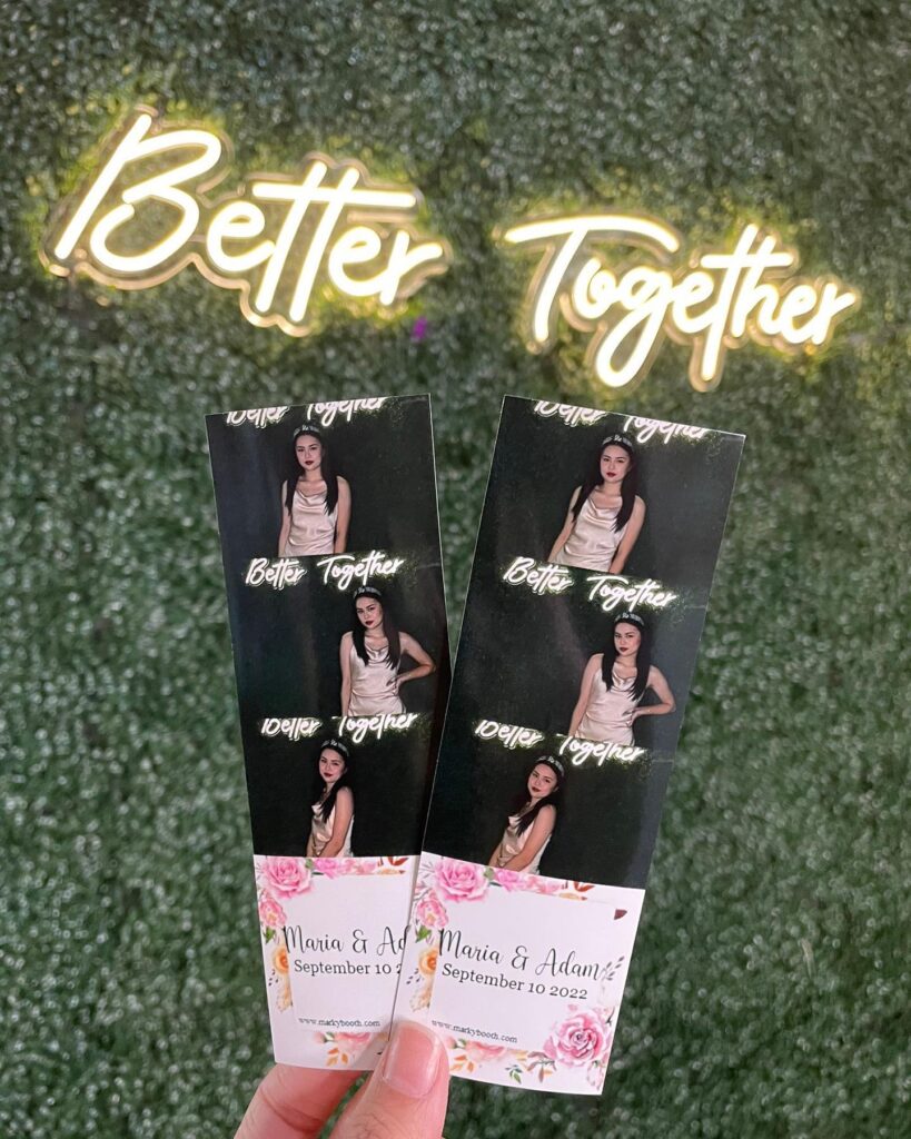 Having fun at a wedding photo booth rental Houston