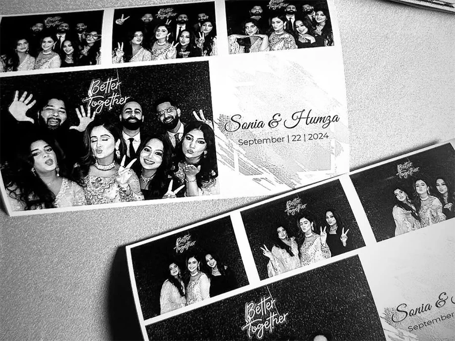 Friends posing in black-and-white photos with Spin Camera Rental in East Downtown for a wedding celebration